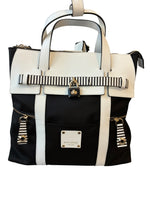 Load image into Gallery viewer, Henri Bendel Black and White Jetsetter Backpack
