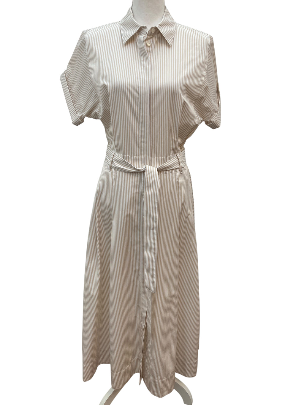 Beige and white striped dress on a mannequin against a white background